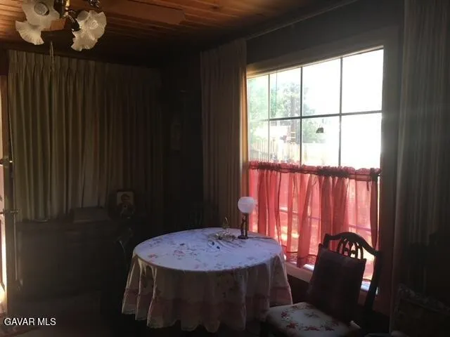 a bathroom with a sink vanity and a mirror
