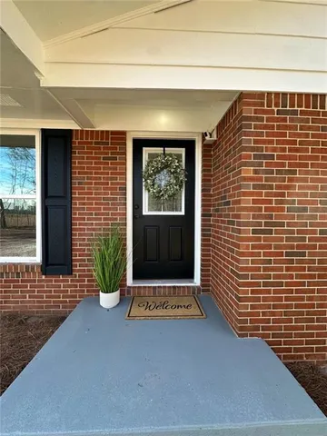 a front view of a house with windows