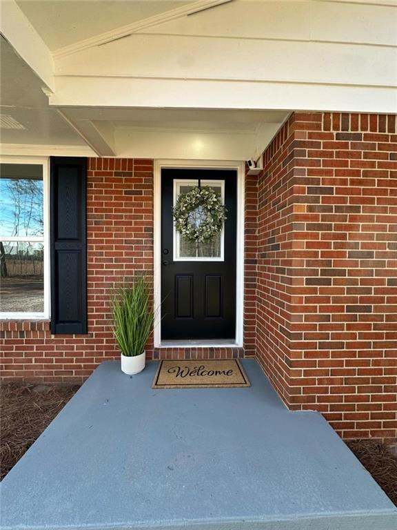 775 Bolton Road Zebulon, GA 30295 - Photo 4 of 17 a front view of a house with windows