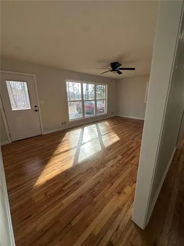a view of an empty room and window