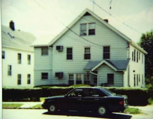 435 Wayne Street Bridgeport, CT 06606 - Photo 1 of 1 a front view of a house with a yard