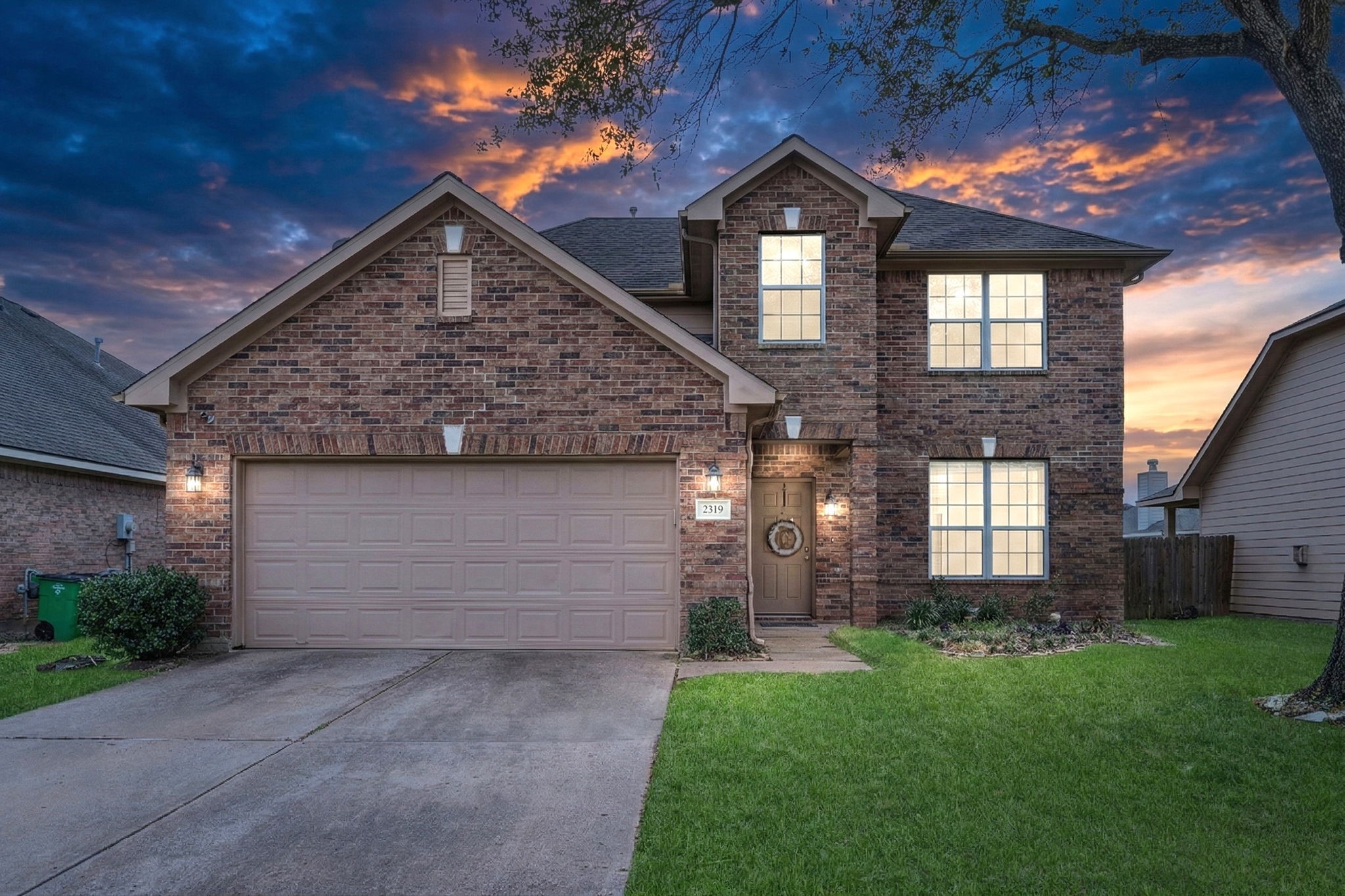 1319 Collier Point Lane Fresno, TX 77545 - Photo 1 of 33 a front view of a house with a garden and plants