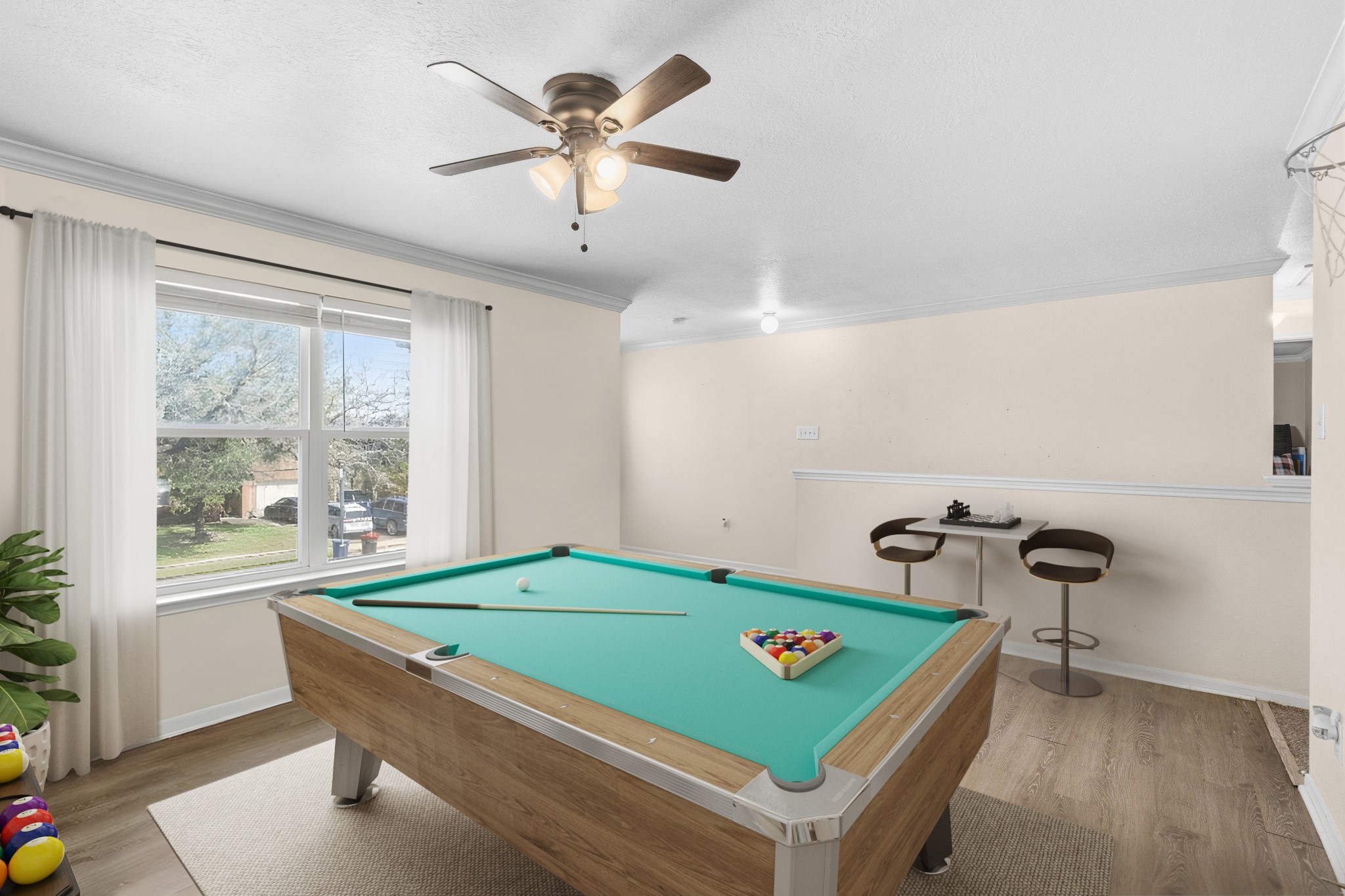 1319 Collier Point Lane Fresno, TX 77545 - Photo 22 of 33 Virtually Staged: This spacious game room is filled with natural light and offers plenty of room for recreation, hobbies, or casual relaxation.