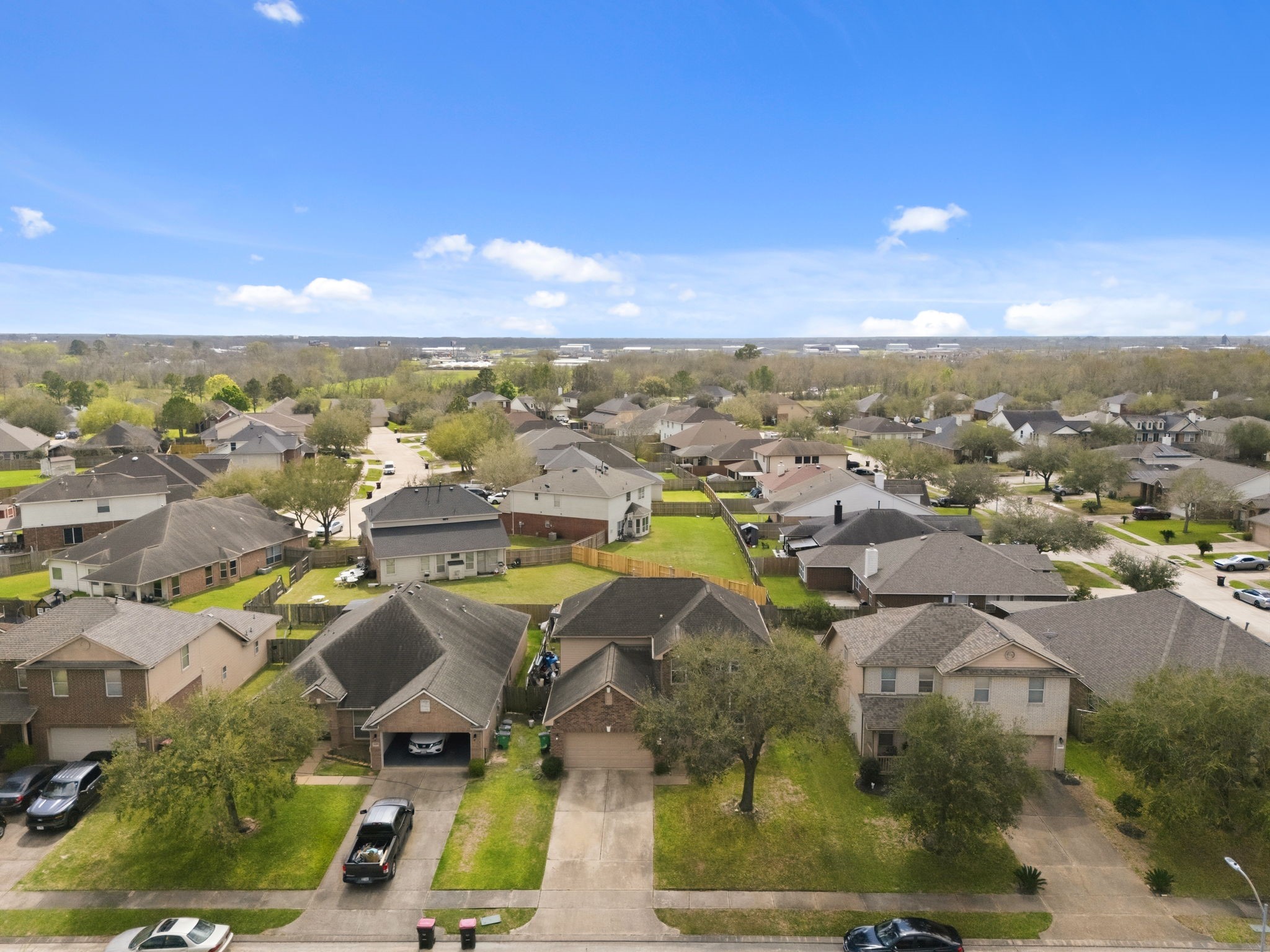 1319 Collier Point Lane Fresno, TX 77545 - Photo 31 of 33 A breathtaking aerial view captures the surrounding neighborhood, showcasing the home's prime location within a peaceful and well-established community.