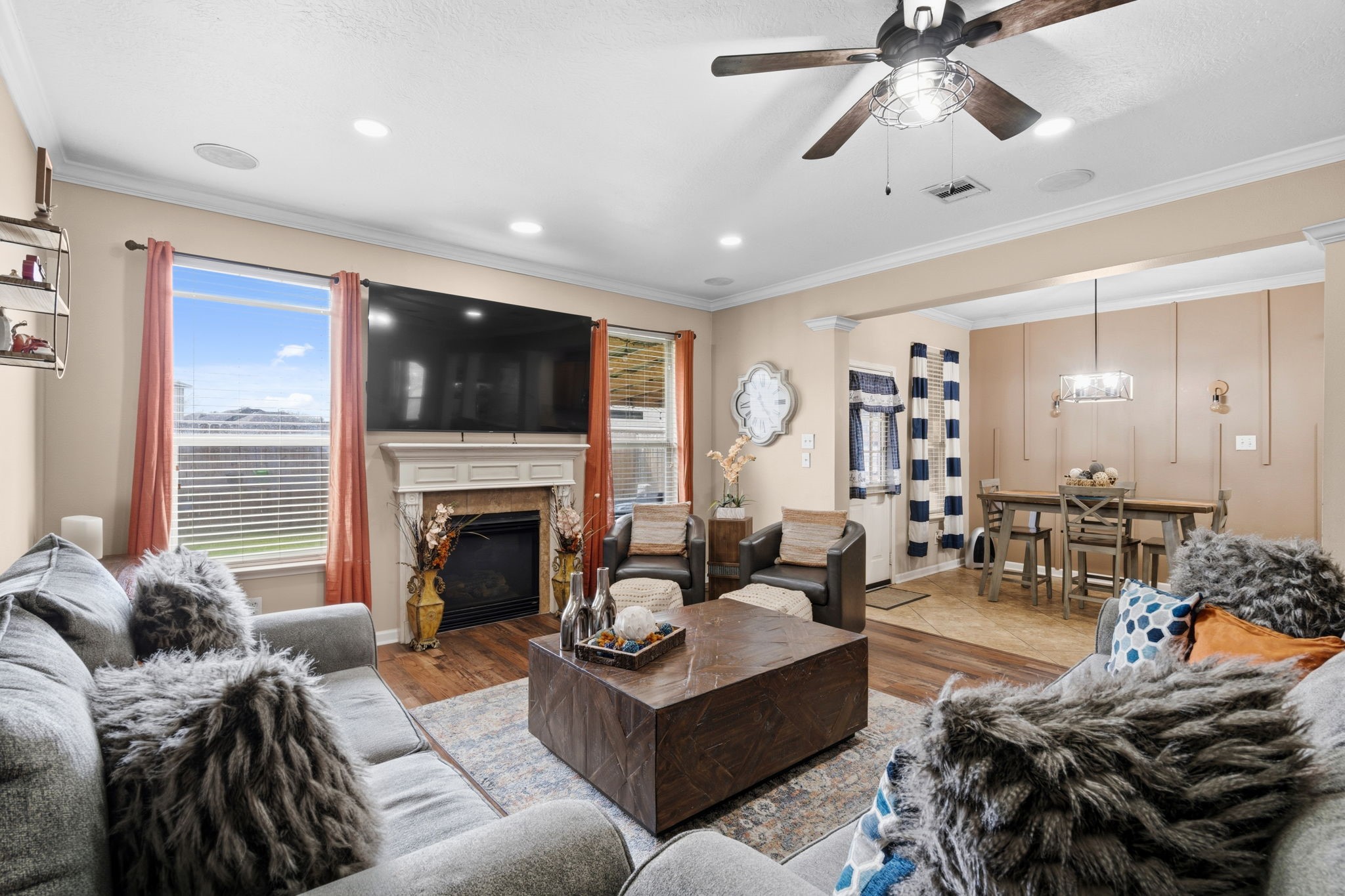 1319 Collier Point Lane Fresno, TX 77545 - Photo 5 of 33 a living room with furniture fireplace and flat screen tv