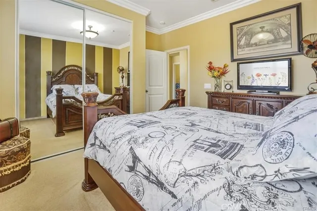 a kitchen with stainless steel appliances granite countertop a stove top oven a sink a refrigerator and a microwave