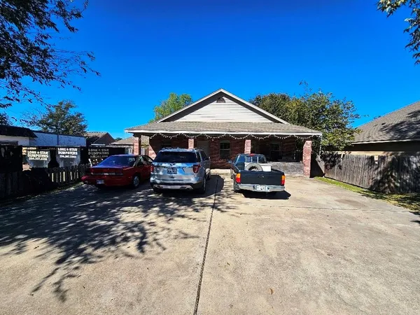 a car parked in front of a house