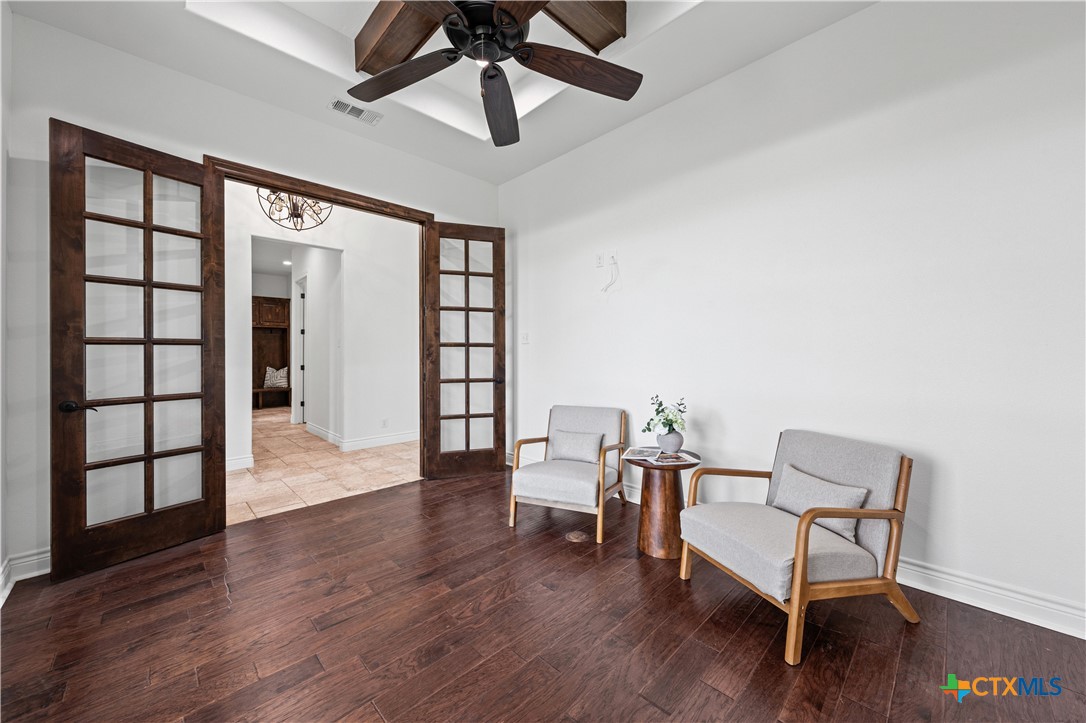 11023 Bigham Road Troy, TX 76579 - Photo 25 of 42 a view of a livingroom with furniture and wooden floor