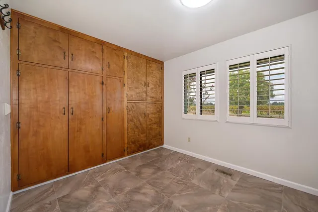 a view of house with outdoor space and porch