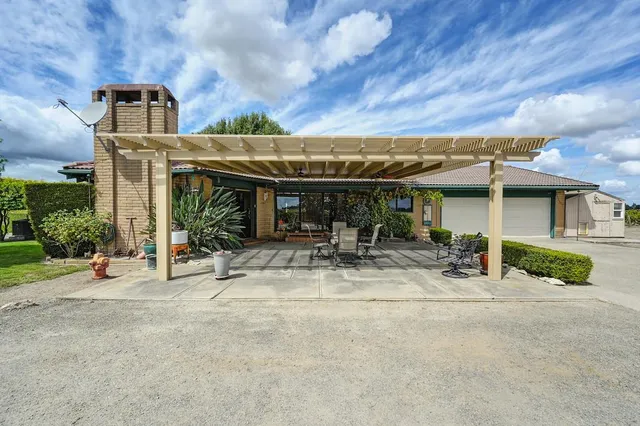 a view of a lake with houses in the back