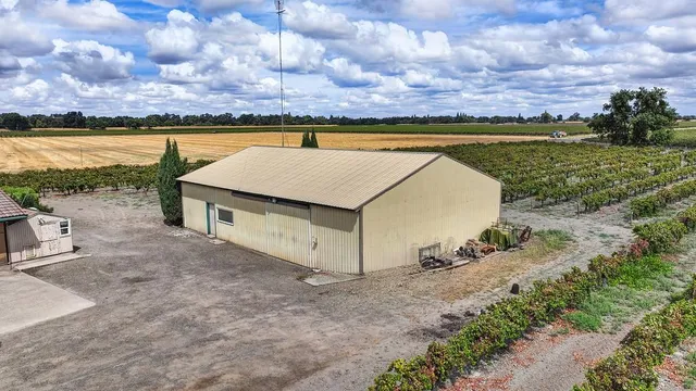 a view of a house with a big yard