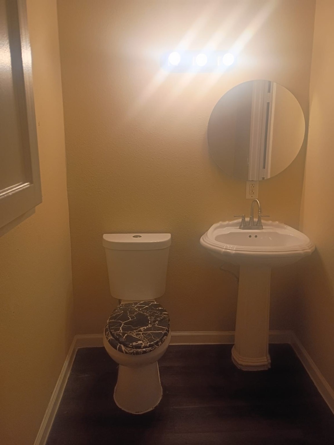 3014 Bloomfield Street Houston, TX 77051 - Photo 11 of 13 a bathroom with a sink and a mirror