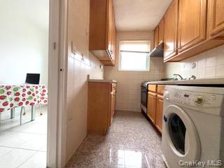 67-20 218th Street, Unit LOWR Queens, NY 11364 - Photo 13 of 17 Washroom featuring washer / dryer