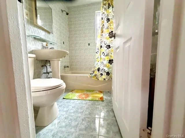 $328,000 | 67-20 218th Street, Unit LOWR | Oakland Gardens