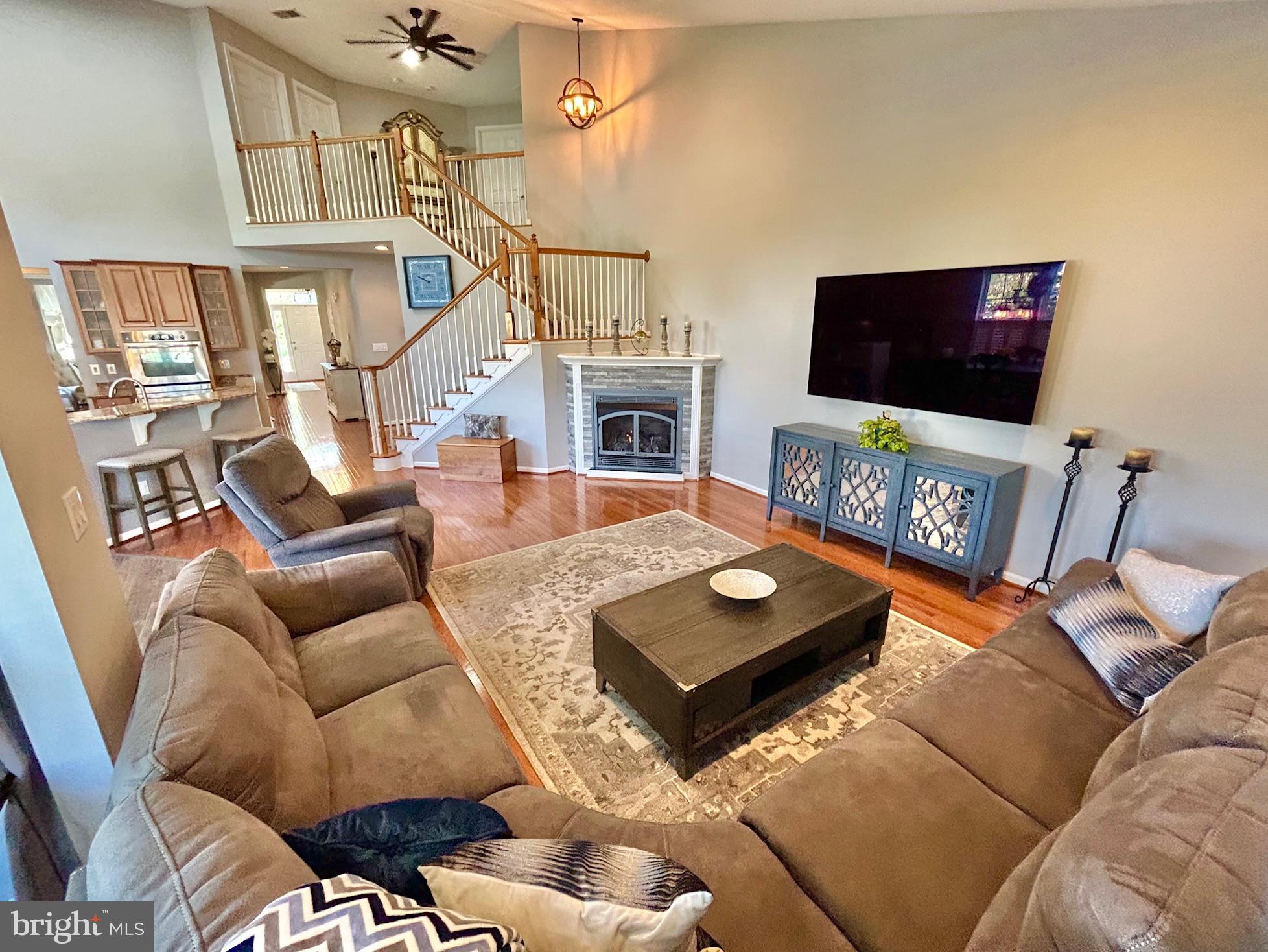 18 Applegate Drive Florence, NJ 08518 - Photo 26 of 81 a living room with furniture and a flat screen tv