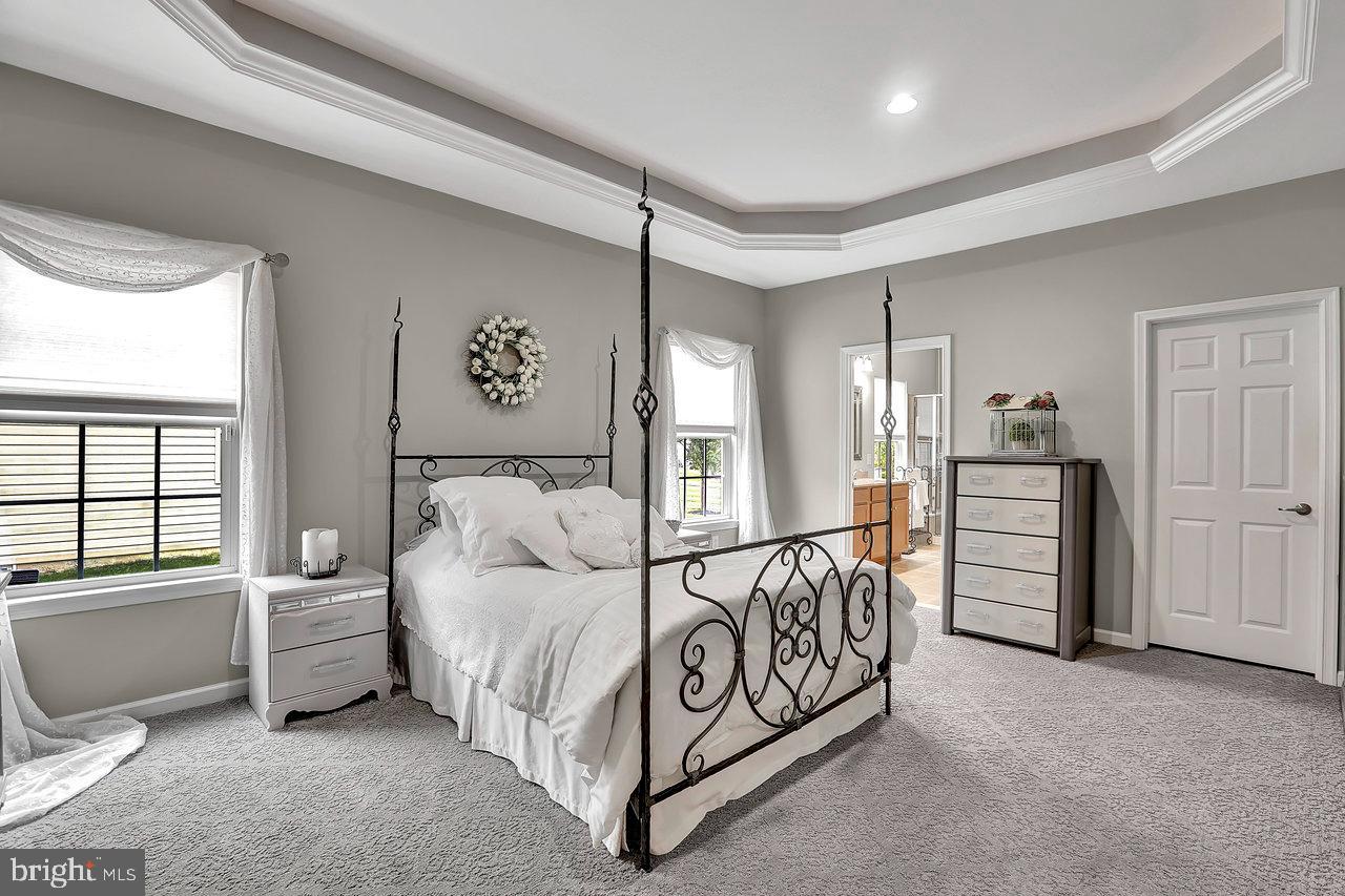 18 Applegate Drive Florence, NJ 08518 - Photo 29 of 81 a spacious bedroom with a bed and a window