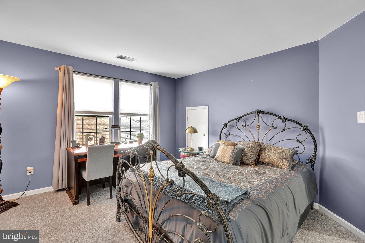 18 Applegate Drive Florence, NJ 08518 - Photo 46 of 81 a bedroom with a bed and a large window
