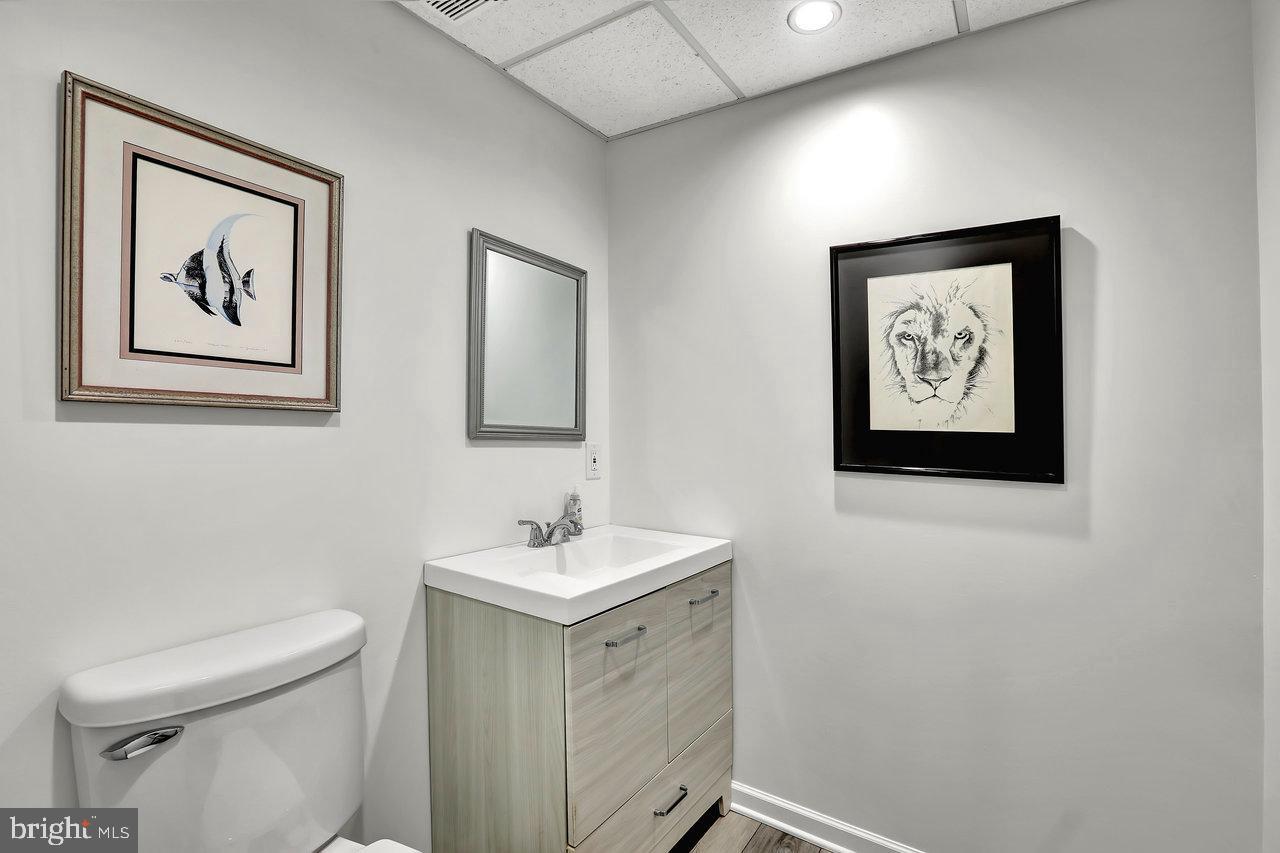 18 Applegate Drive Florence, NJ 08518 - Photo 51 of 81 a bathroom with a toilet sink and mirror