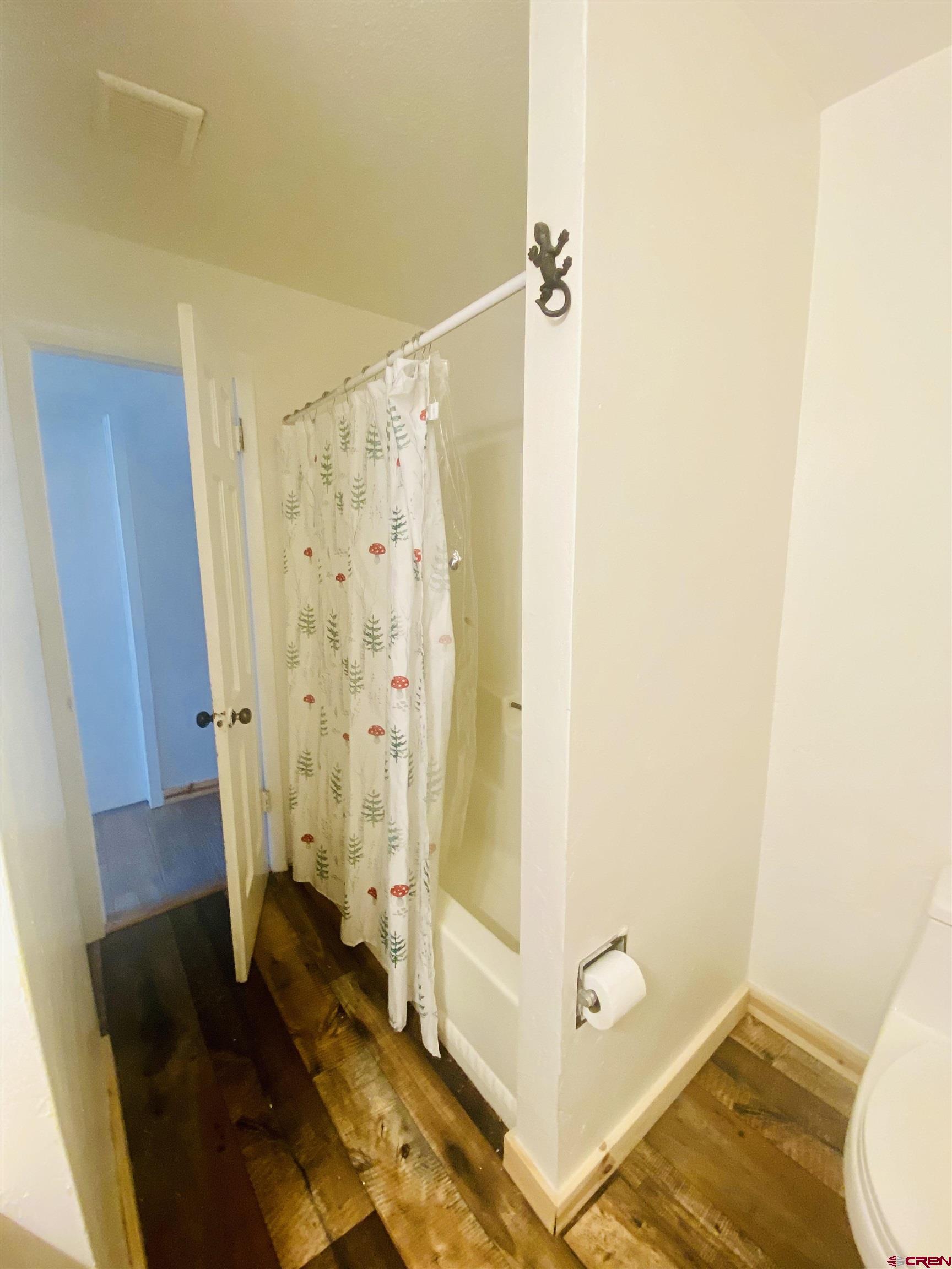 646 Riverside Avenue Mancos, CO 81328 - Photo 11 of 36 a bathroom with a sink and a mirror