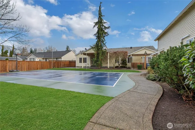 a view of a house with swimming pool