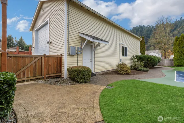 a view of backyard with a garden and plants