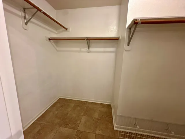 a view of a room with racks on the wall