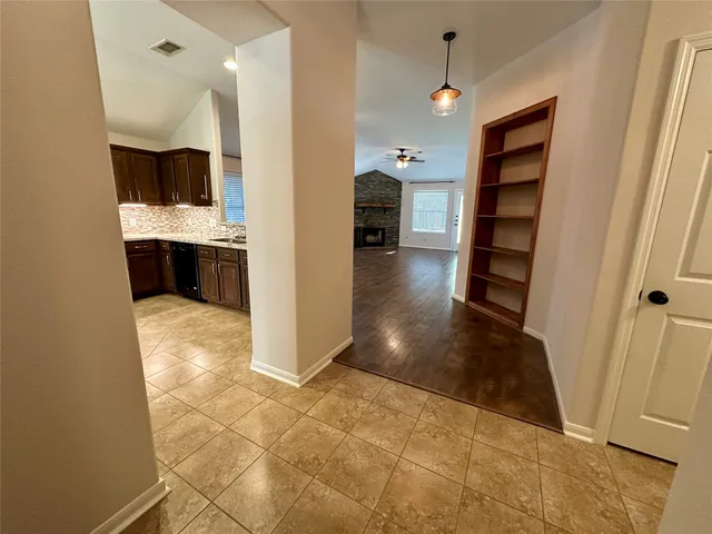a view of kitchen with furniture and a kitchen