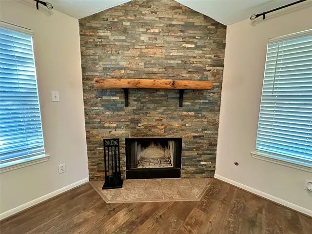 a living room with a fireplace