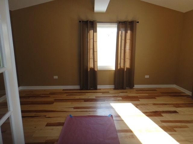 5711 Willow Springs Road Countryside, IL 60525 - Photo 9 of 19 a view of room with wooden floor