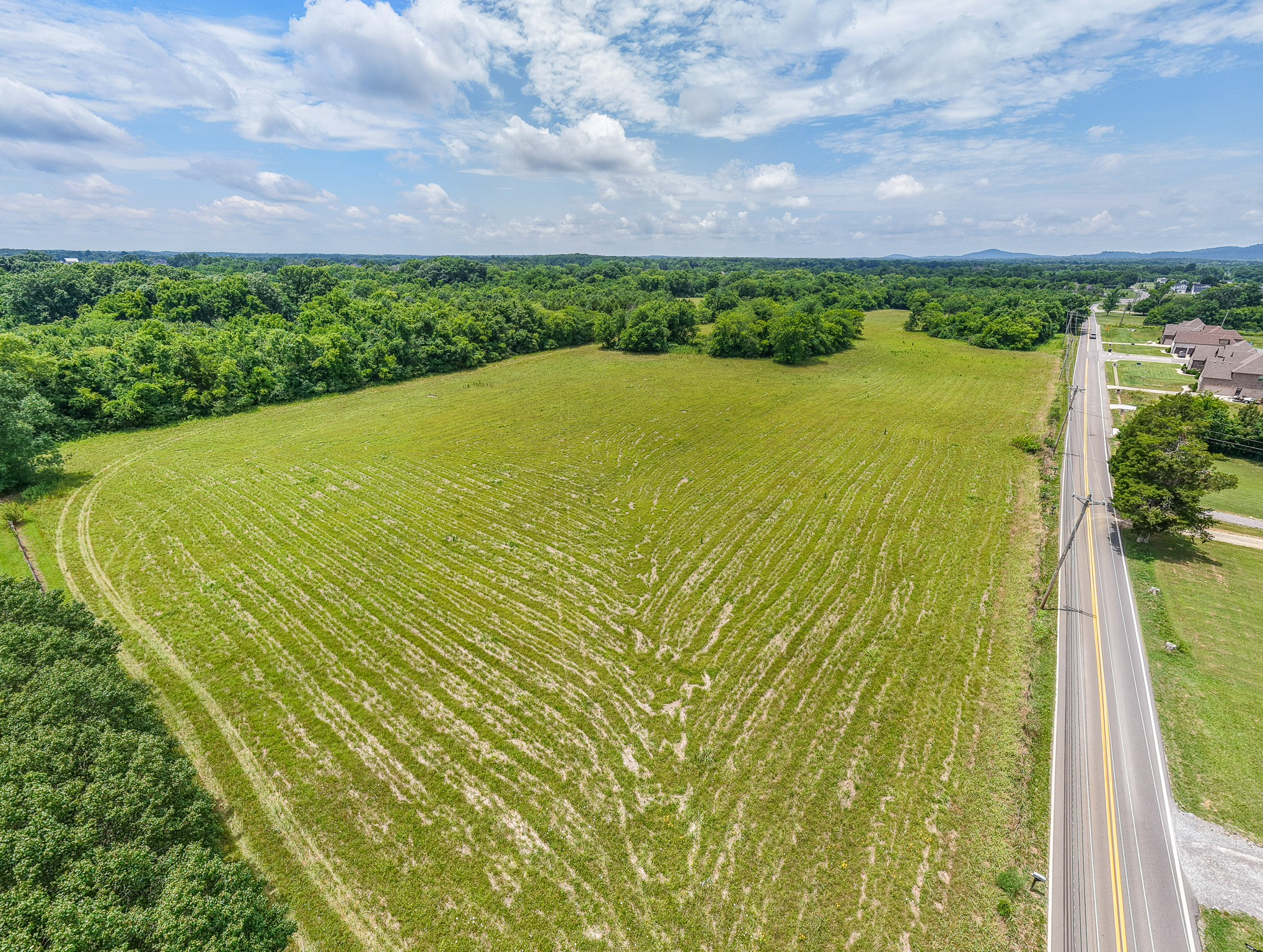873 Walnut Grove Road Christiana, TN 37037 - Photo 14 of 29 a view of a lake from a yard
