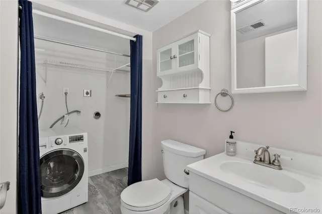 a bathroom with a sink and a toilet