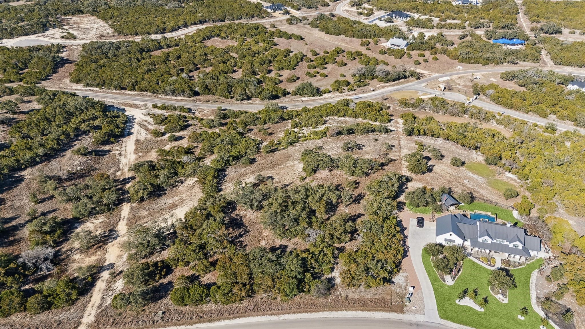1021 Malbec Loop Canyon Lake, TX 78133 - Photo 2 of 10 a view of a yard