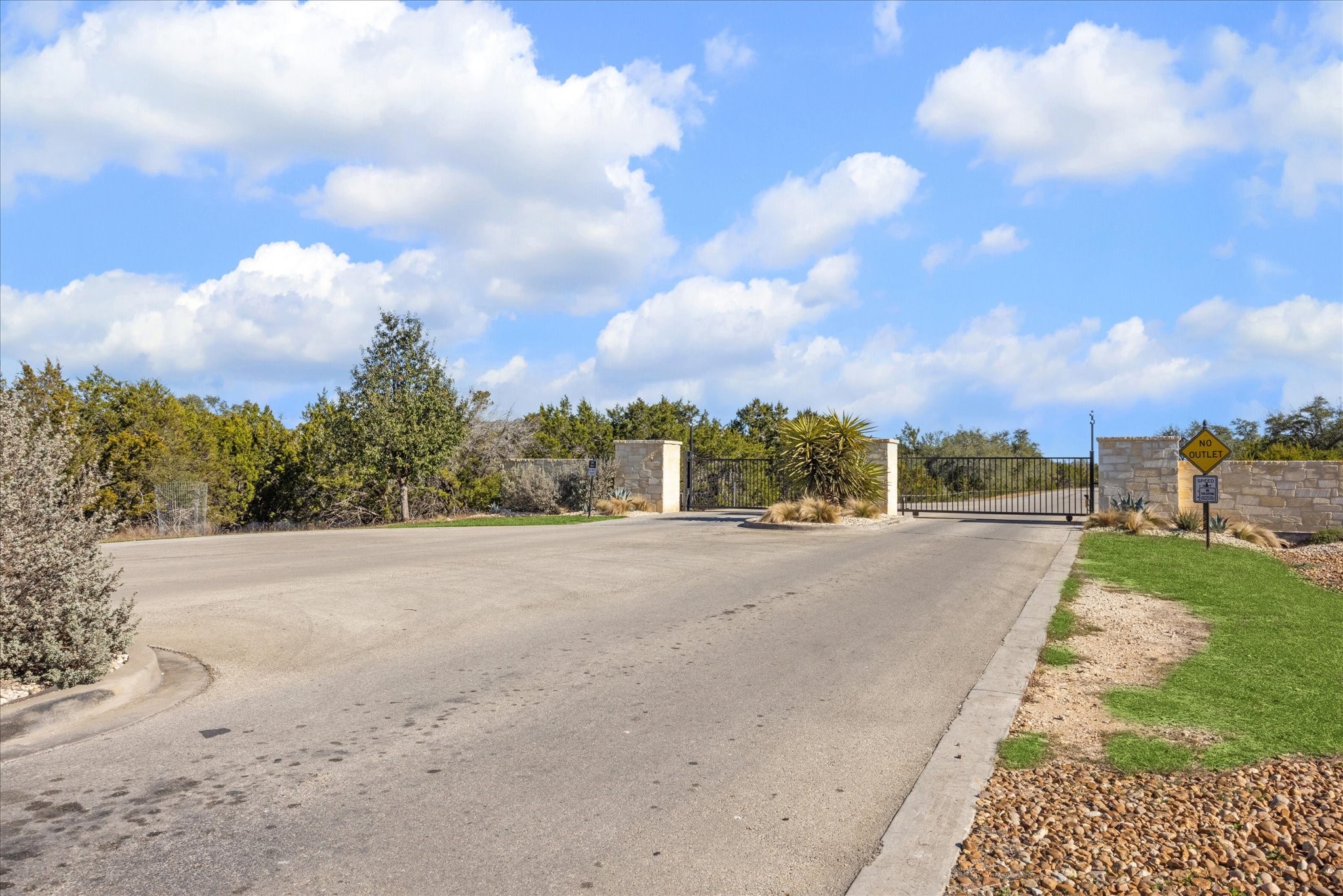 1021 Malbec Loop Canyon Lake, TX 78133 - Photo 3 of 10 a view of a road with a building in the background