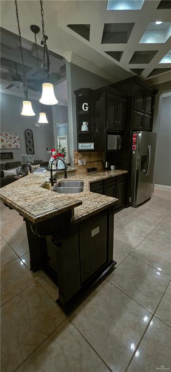 1305 Mountain Road Mission, TX 78573 - Photo 13 of 43 a kitchen with a sink and a stove