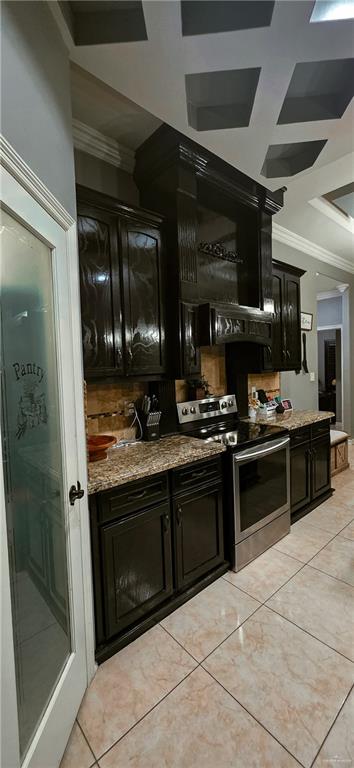 1305 Mountain Road Mission, TX 78573 - Photo 14 of 43 a kitchen with stainless steel appliances granite countertop a stove and a sink