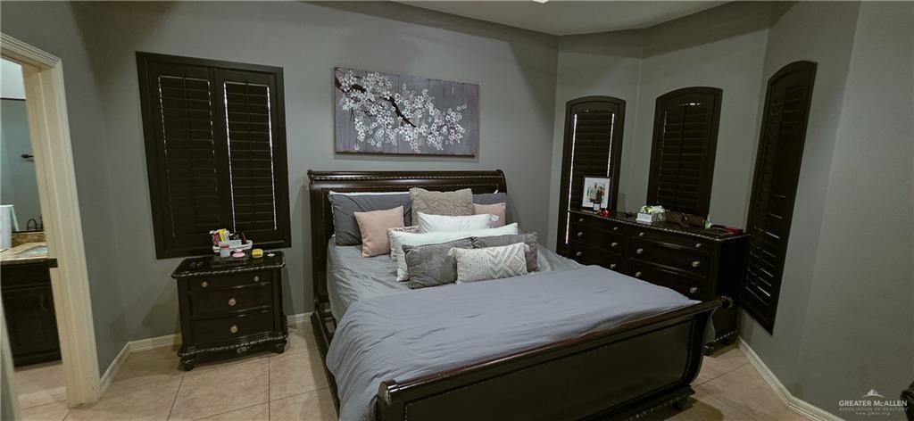 1305 Mountain Road Mission, TX 78573 - Photo 17 of 43 a bedroom with a bed and a closet