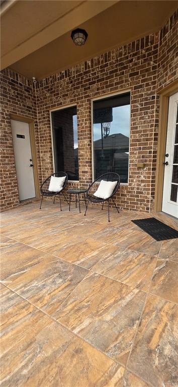 1305 Mountain Road Mission, TX 78573 - Photo 29 of 43 a view of a patio with table and chairs and wooden floor