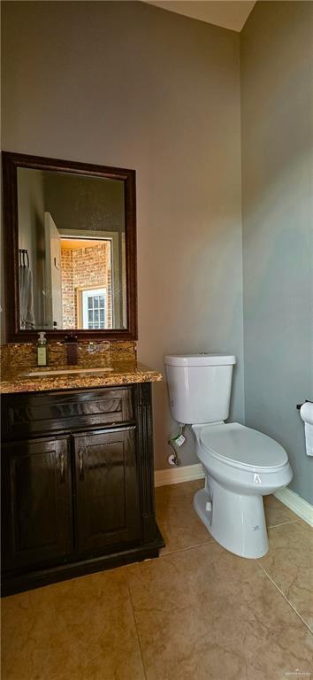 1305 Mountain Road Mission, TX 78573 - Photo 30 of 43 a bathroom with a sink and a toilet