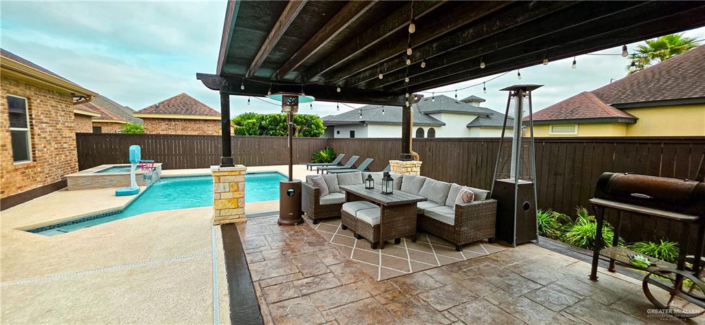 1305 Mountain Road Mission, TX 78573 - Photo 37 of 43 a patio with patio couch and table