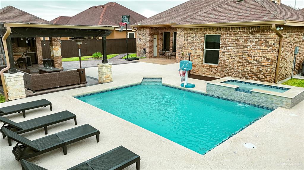 1305 Mountain Road Mission, TX 78573 - Photo 40 of 43 a view of a backyard with furniture
