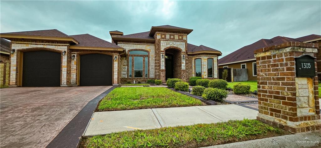 1305 Mountain Road Mission, TX 78573 - Photo 4 of 43 front view of a house