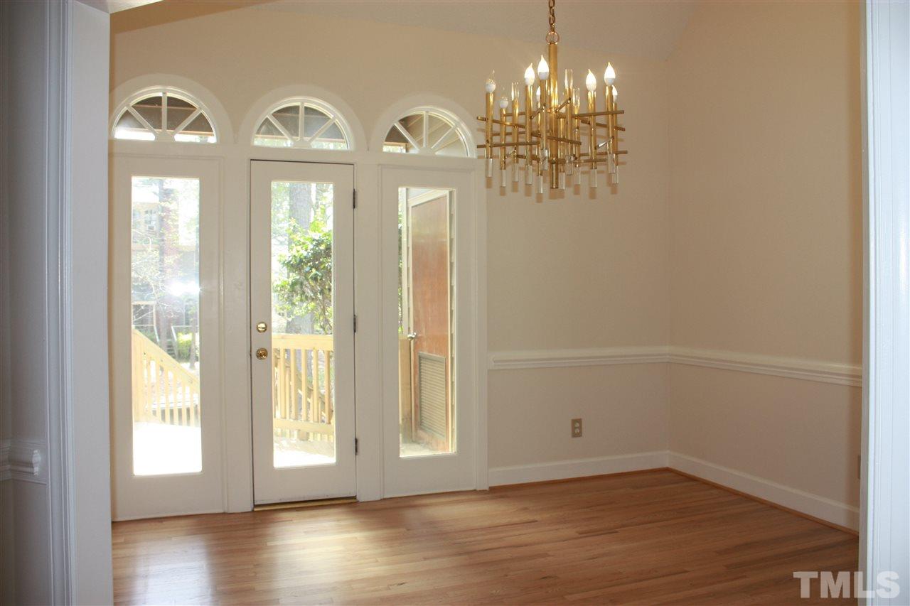 7924 Footman Way Raleigh, NC 27615 - Photo 5 of 17 Separate dining room leads out to the deck