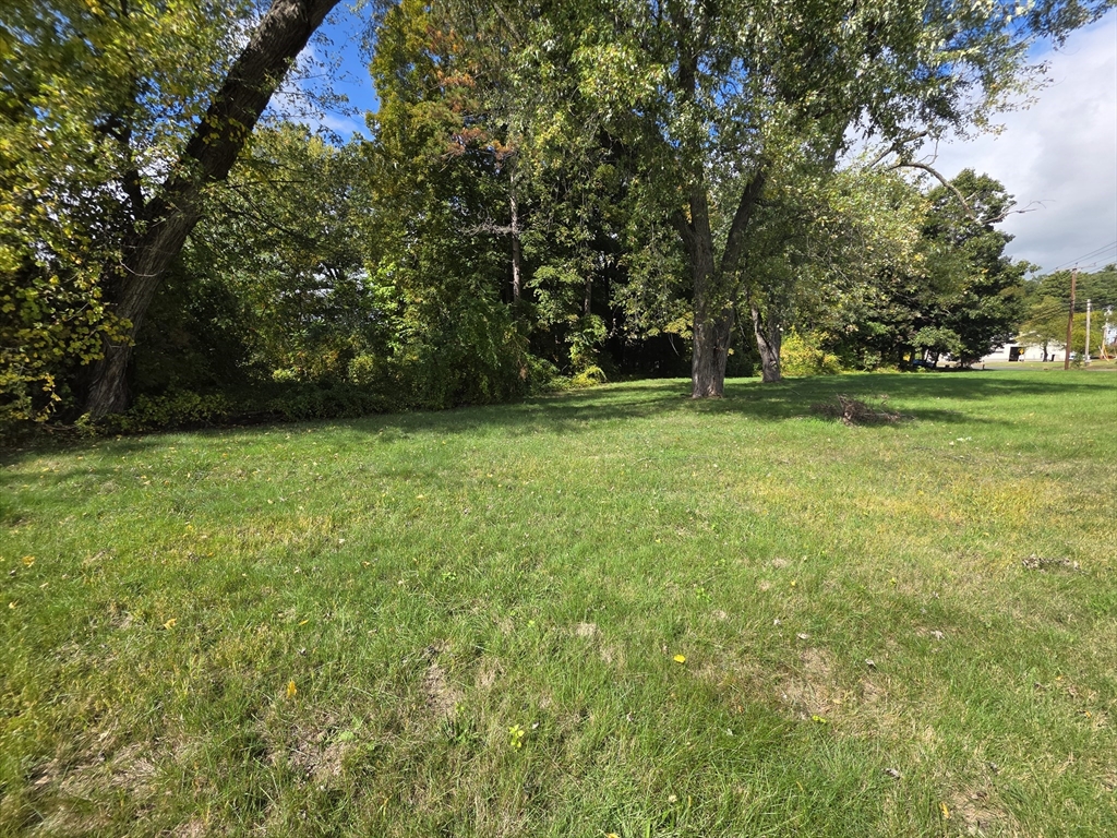 1415 Park Street Palmer, MA 01069 - Photo 9 of 12 a view of a green field with trees