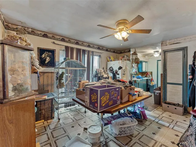 a bedroom with furniture and a chandelier