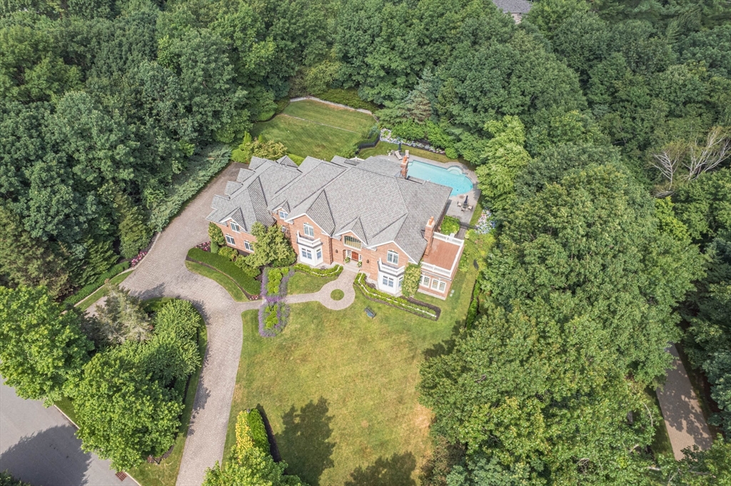 9 Regency Ridge Andover, MA 01810 - Photo 5 of 5 an aerial view of a house with swimming pool and backyard