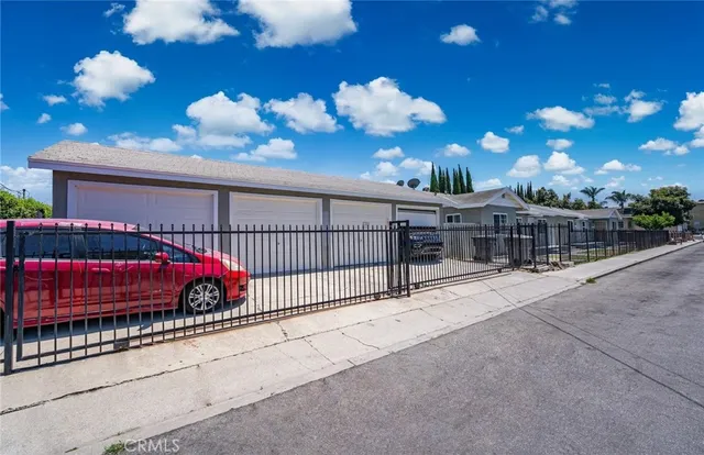 a view of a balcony with potted plants