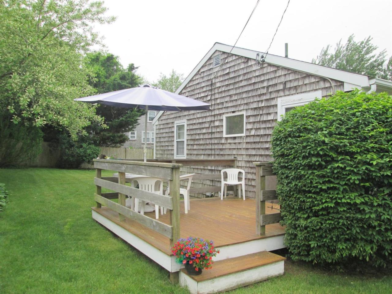 71 Seabrook Road Hyannis, MA 02601 - Photo 12 of 13 a view of a house with a yard