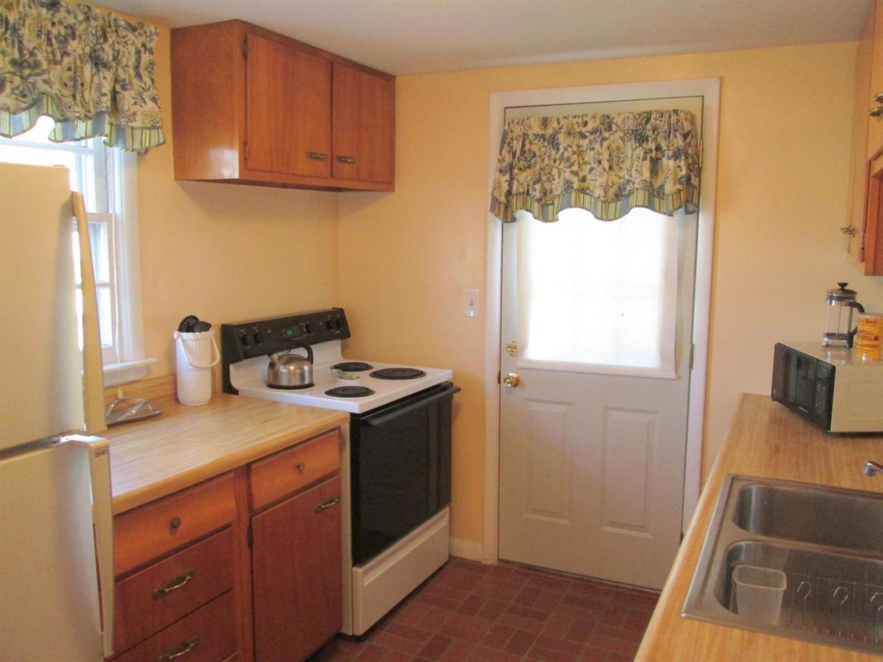 71 Seabrook Road Hyannis, MA 02601 - Photo 5 of 13 a utility room with sink dryer and washer