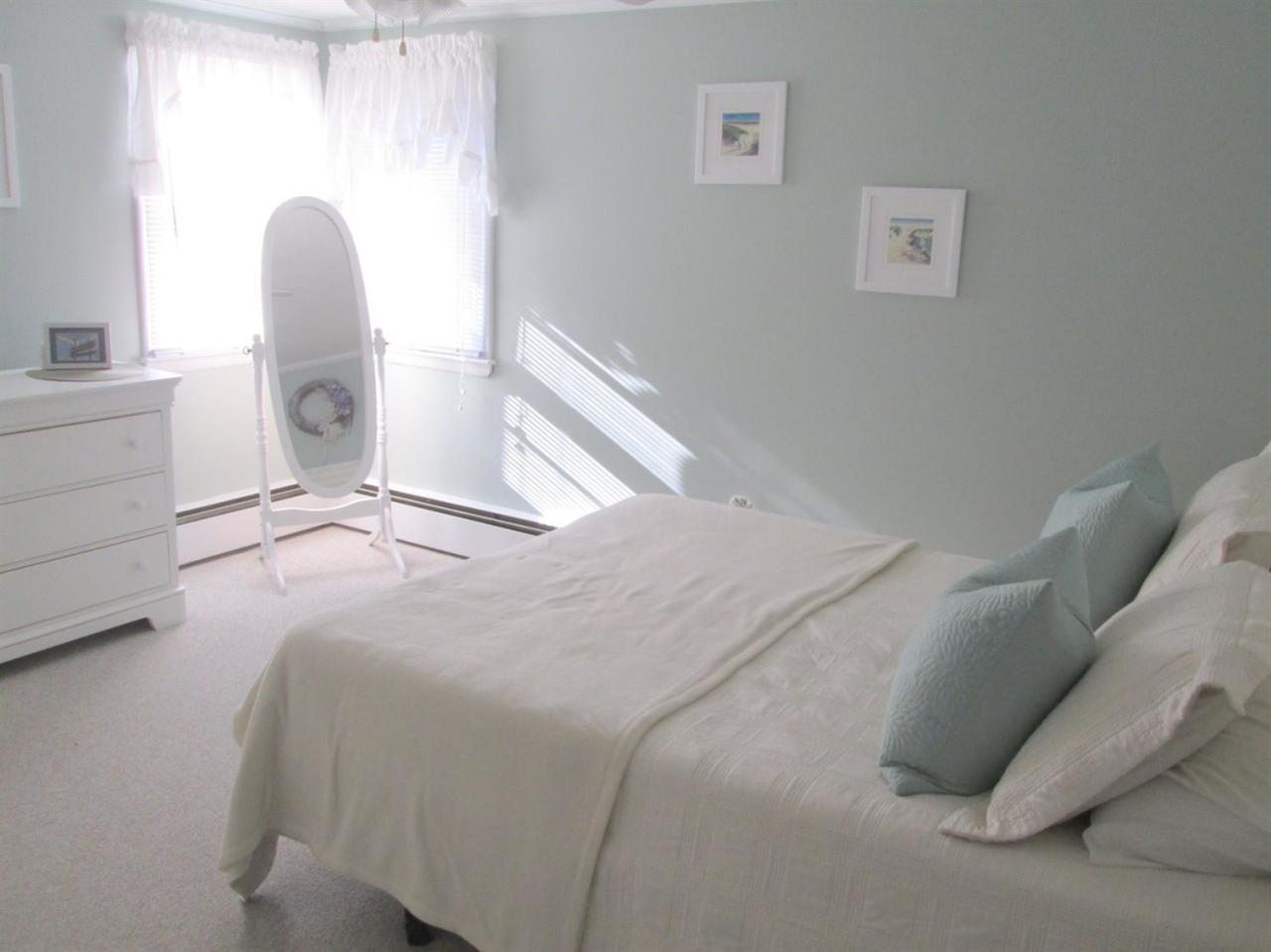 71 Seabrook Road Hyannis, MA 02601 - Photo 6 of 13 a bedroom with a bed and a window