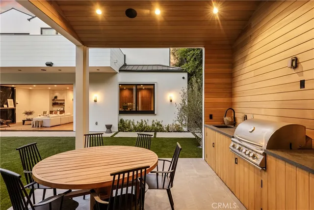 a view of a swimming pool with a yard